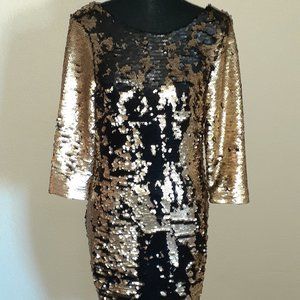 Black and gold sequin dress